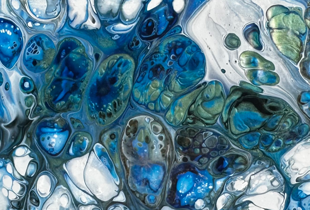 Dense cobalt and green-gold cells packed against the cigar box lid edges