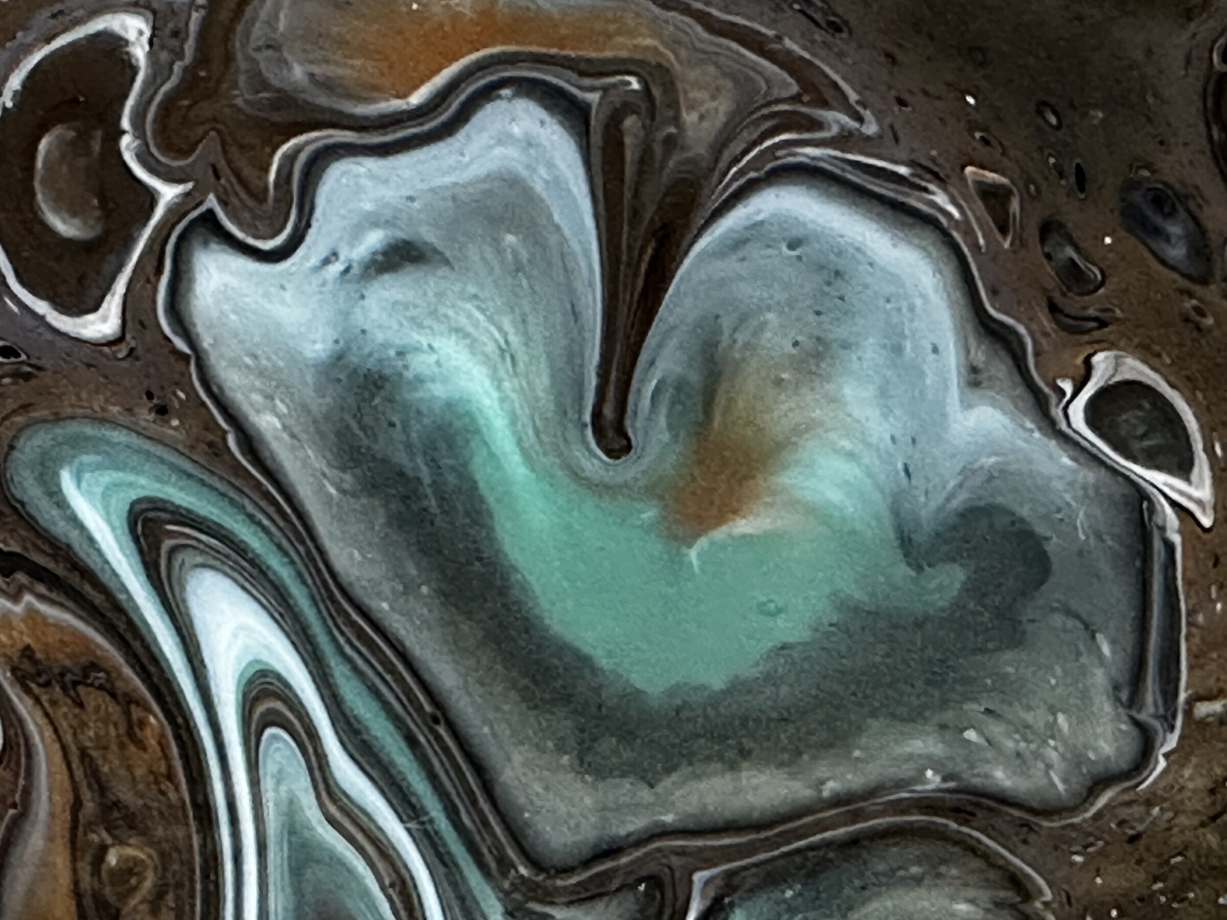 Large teal cell in the paint skin surface