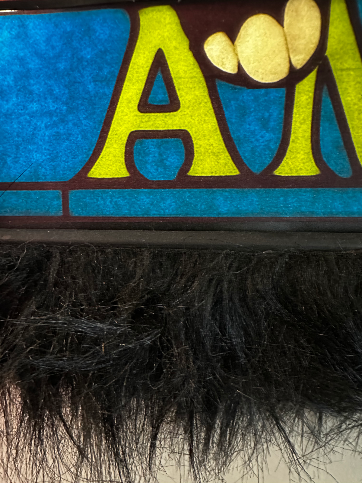 Close-up of the AMOR section showing the seam line and electrical tape